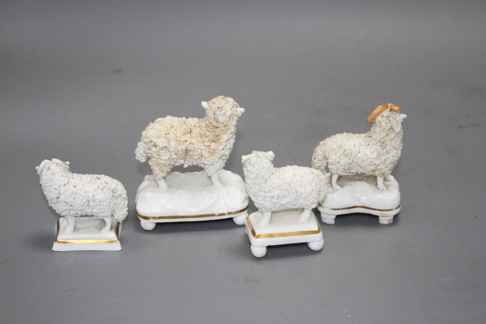 Four Staffordshire porcelain figures of three rams and a ewe c.1830-50,